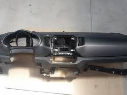 Ornament plansa bord Kia Sportage 4WD 2.0 CRDI cod motor D4HA transminie automata ,an 2011 cod 84795...