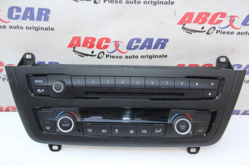 Panou comenzi clima si radio BMW X5 2007-2013 E70