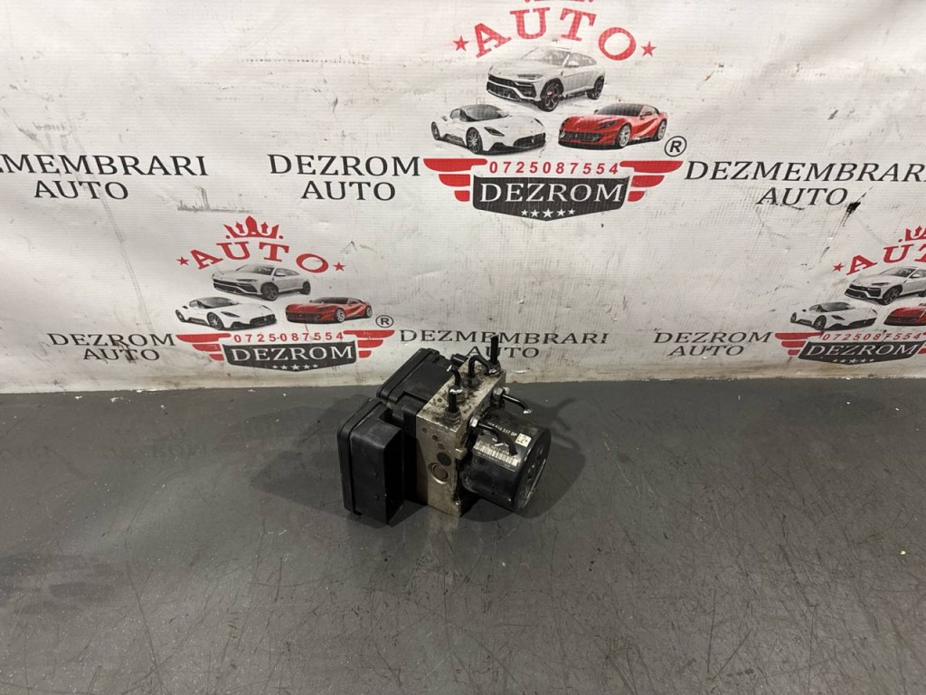 Pompa ABS 1K0614517DP / 1K0907379BL VW Caddy III Break (2KB, 2KJ) 2.0 TDI 140 cai BMM