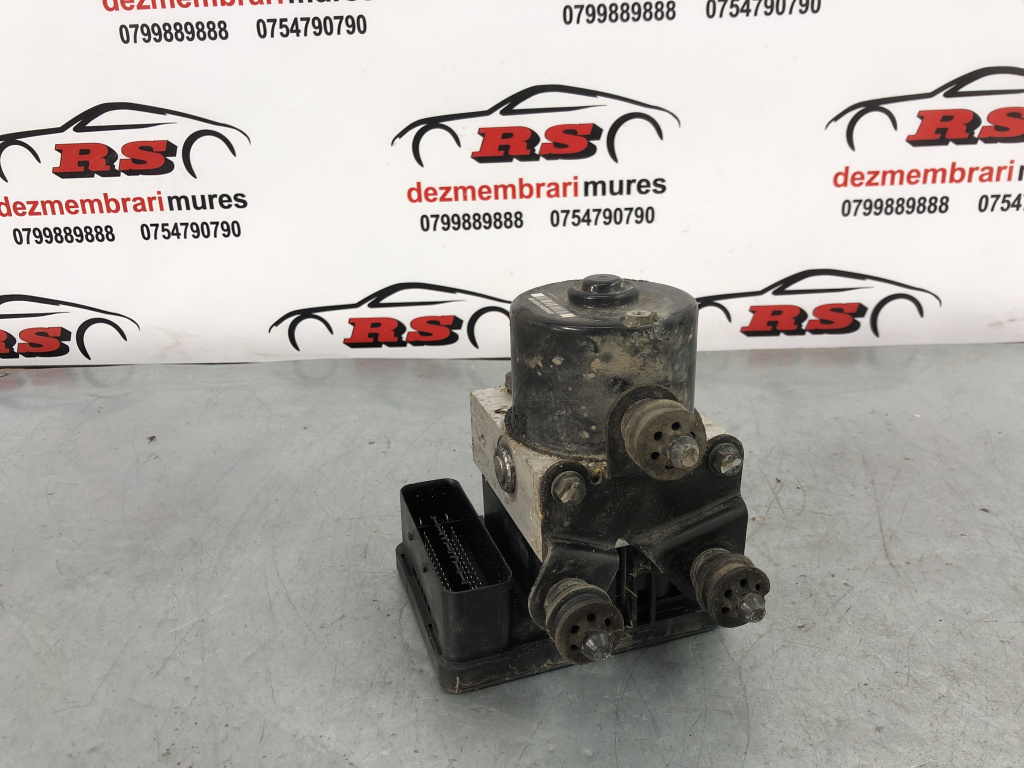 Pompa abs VW Caddy 2.0 TDI 140cp BMM Utilitara sedan 2008 (1K0907379AC)