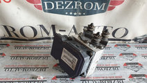 Pompa ABS VW Passat B7 1.6 TDI 105 cai motor CAYC ...