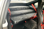 Porsche 911 cu scaun sofer central