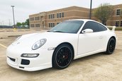 Porsche 911 cu scaun sofer central