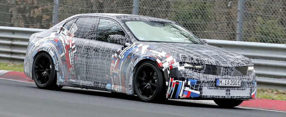 Primul BMW M3 cu propulsie electrica din istorie, fotografiat din nou in timpul testelor. Controversatul model bavarez ar putea oferi patru motoare si 1.360 de cai putere in versiunea de top Primul BMW M3 cu propulsie electrica din istorie, fotografiat din nou in timpul testelor. Controversatul model bavarez ar putea oferi patru motoare si 1.360 de cai putere in versiunea de top