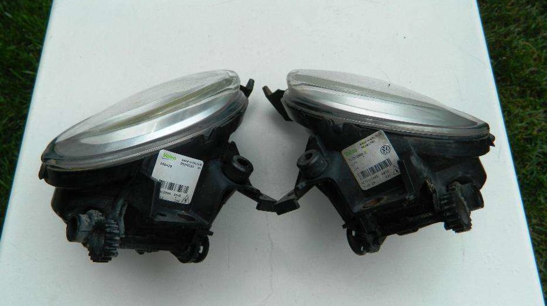 Proiectoare stanga VW TOUAREG COD 7L5941699C,7L5941699D model 2002-2010