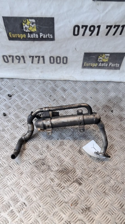 Racitor gaze Vw Touran 1.9 TDI 105CP cod motor BLS an 2008 cod 03G131512AD