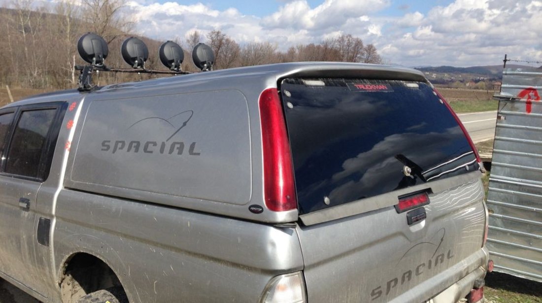 SCHIMB HARDTOP MITSUBISHI L200 AN 2004 CU ROLLBAR