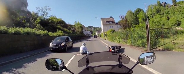 Scuterist lovit de un sofer in Germania, soferul este prins de un motociclist