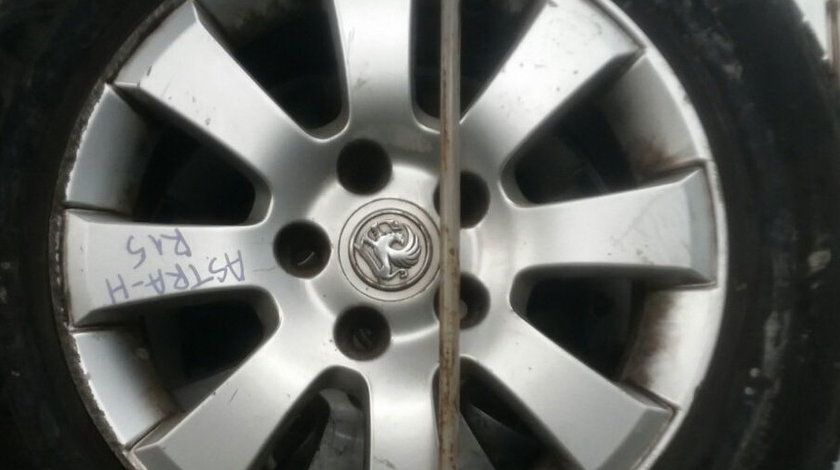 Set 18.001 - Opel Astra H R15 195/65 , 6.5j x 15 et35, 5 x 110