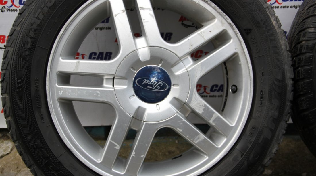 Set jante aliaj cu anvelope M+S de iarna 195 / 65 / R15 6JX15H2 cod: 98AB-DA 4X108 Ford Focus 1 model 2001