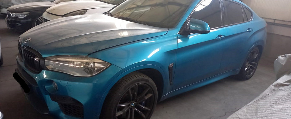 Statul roman scoate la licitatie un BMW X6 M confiscat de curand. Bolidul german se lauda cu un motor V8 twin-turbo de 4.4l si 575 CP Statul roman scoate la licitatie un BMW X6 M confiscat de curand. Bolidul german se lauda cu un motor V8 twin-turbo de 4.4l si 575 CP