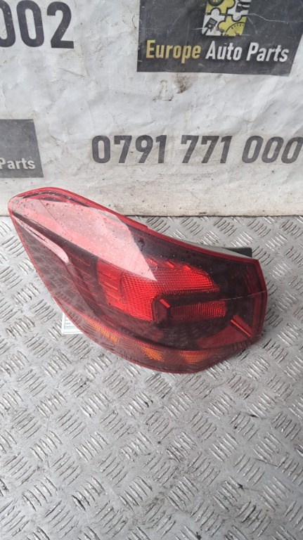 Stop stanga aripa Opel Astra J combi an 2011 cod 13314052