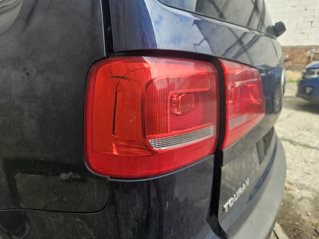 Stop stanga aripa Volkswagen Touran 2012, 1T0945095R