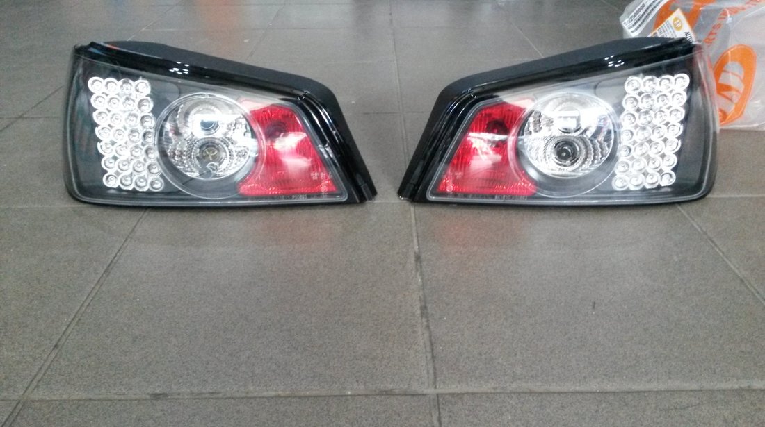 Stopuri / Triple LED PEUGEOT 306 BLACK LICHIDARE STOC 200 ron !!