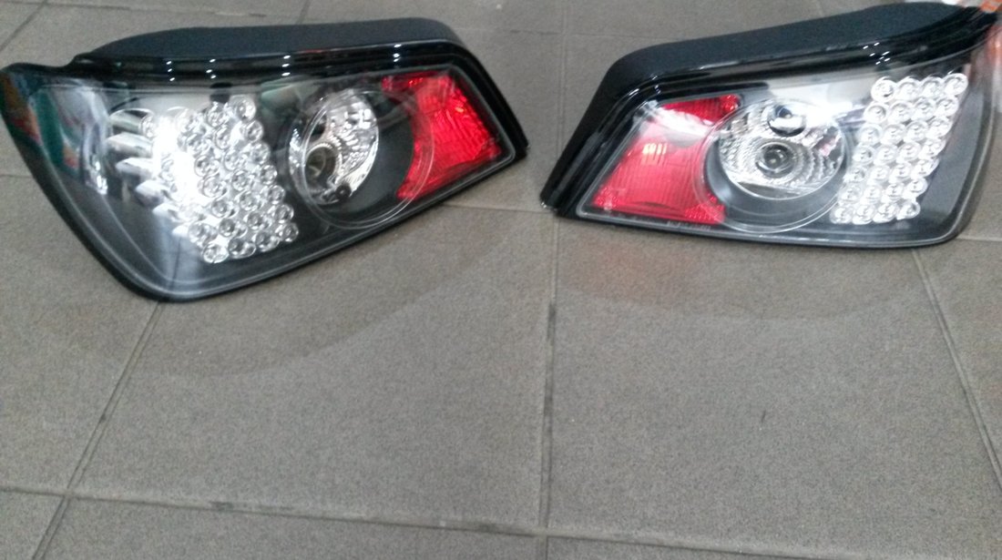 Stopuri / Triple LED PEUGEOT 306 BLACK LICHIDARE STOC 200 ron !!