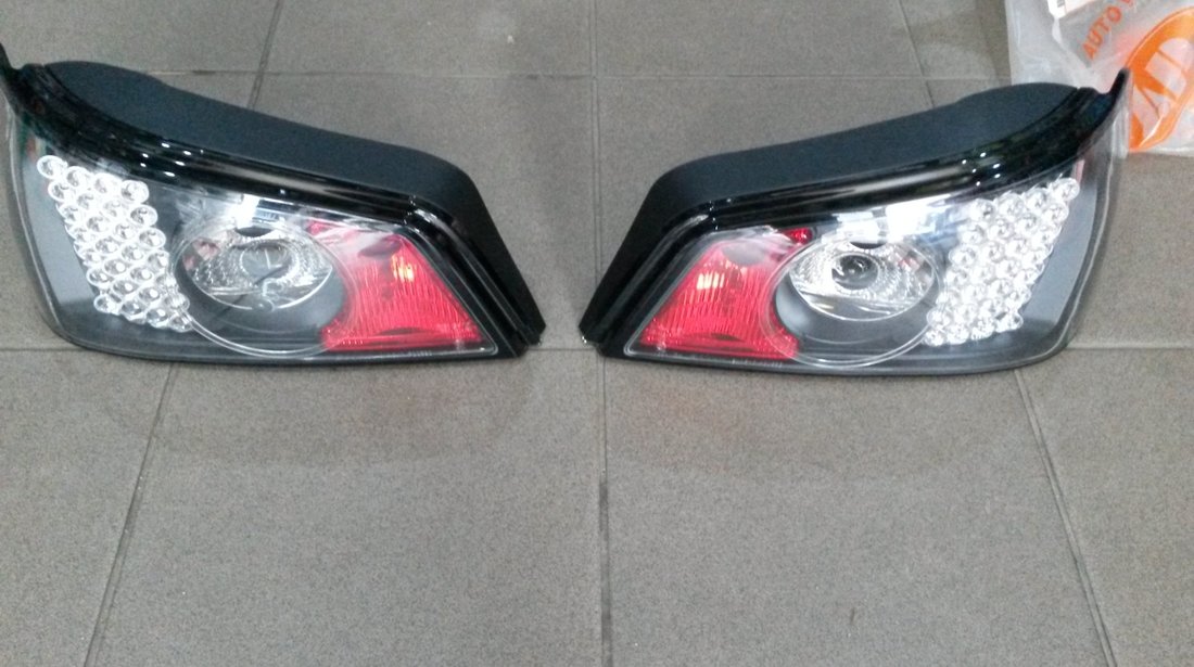 Stopuri / Triple LED PEUGEOT 306 BLACK LICHIDARE STOC 200 ron !!