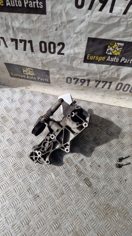 Suport accesorii Skoda Superb 1.9 TDI cod motor BPZ an 2008 cod 038903143AE