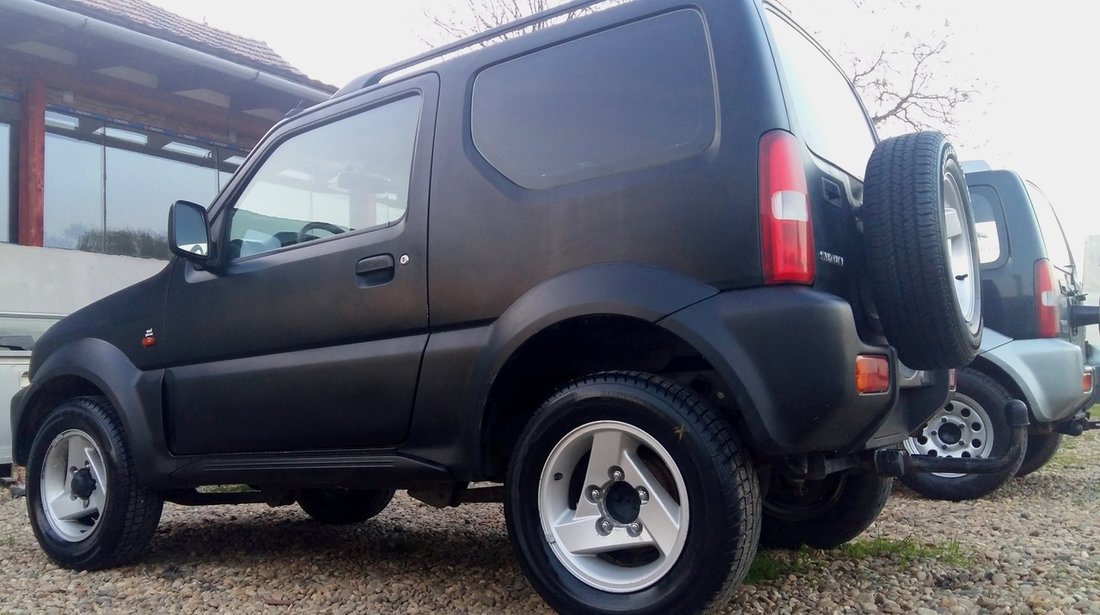 Suzuki Jimny 1.3i 16V  cu CLIMA 2000