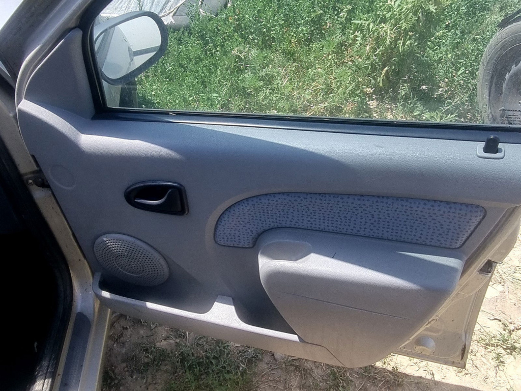 Tapiterie usa dreapta fata Dacia Logan (LS) [Fabr 2004-2012] 1.6 B K7M-F7 64KW / 87CP