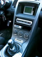 Click image for larger version

Name:	0410it_07z+Nissan_350z+Interior_View_Center_Console.jpg
Views:	23
Size:	51.2 KB
ID:	1449992