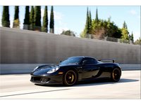 Click image for larger version

Name:	porsche_carrera_gt_in_motion_1-568-426.jpg
Views:	341
Size:	51.7 KB
ID:	796742