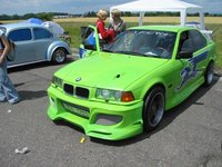 Click image for larger version

Name:	fluffyczechbmwgreenw1.jpg
Views:	172
Size:	104.0 KB
ID:	487448