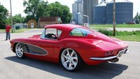 Click image for larger version

Name:	1960RedRestomodVette.jpg
Views:	52
Size:	300.5 KB
ID:	3103946