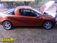 Click image for larger version

Name:	Opel-Tigra-1-63.jpg
Views:	55
Size:	272.9 KB
ID:	2863536