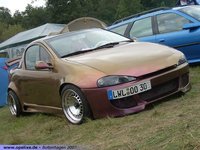 Click image for larger version

Name:	opel-tigra-tuning_2887329.jpg
Views:	30
Size:	70.8 KB
ID:	2868448