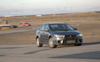 Click image for larger version

Name:	3112_0803_08z+2008_mitsubishi_EVO_X+front_motion.jpg
Views:	518
Size:	128.6 KB
ID:	427871