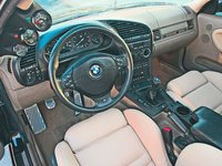 Click image for larger version

Name:	160_0608_et_11z+1995_BMW_318is+Interior_Dash.jpg
Views:	157
Size:	68.6 KB
ID:	1636914