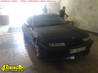 Click image for larger version

Name:	Opel-Calibra-2-000 (1).jpg
Views:	58
Size:	109.5 KB
ID:	1893027