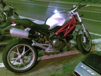 Click image for larger version

Name:	big-ducati-monster-1100-2009-01.jpg
Views:	631
Size:	190.7 KB
ID:	632407