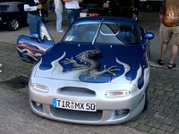 Click image for larger version

Name:	normal_NonStockColorMiata-033.jpg
Views:	44
Size:	59.1 KB
ID:	1498425