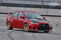 Click image for larger version

Name:	EVO X with ix wing2.jpg
Views:	86
Size:	112.9 KB
ID:	972295