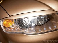 Click image for larger version

Name:	eurp_1005_19_o+2005_audi_a4_1_8t+headlight_view.jpg
Views:	42
Size:	79.8 KB
ID:	1542764