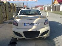 Click image for larger version

Name:	Peugeot-206-cabrio (4).jpg
Views:	43
Size:	60.8 KB
ID:	1986846