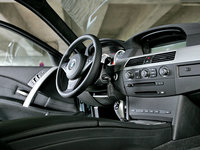 Click image for larger version

Name:	0607_x+2007_bmw_m5+interior.jpg
Views:	427
Size:	132.4 KB
ID:	131698