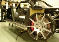 Click image for larger version

Name:	carbon_rims_on_naked_chassis_mid_build[1]scdo.jpg
Views:	723
Size:	704.1 KB
ID:	107936