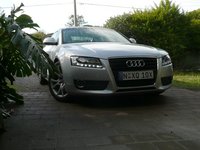 Click image for larger version

Name:	audi-a5-review-8-big.jpg
Views:	314
Size:	251.3 KB
ID:	690098