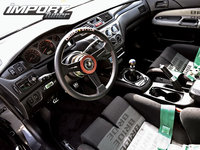 Click image for larger version

Name:	0707_impp_12z+2006_mitsubishi_evo_9_mr+steering_wheel.jpg
Views:	183
Size:	121.5 KB
ID:	958907