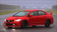 Click image for larger version

Name:	civic-mugen-rr-posing-on-rainy-track.jpg
Views:	30
Size:	20.9 KB
ID:	2486498