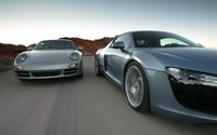 Click image for larger version

Name:	112_0702_19z+audi_r8_porsche_911+front_three_quarter_view.jpg
Views:	247
Size:	30.7 KB
ID:	216094