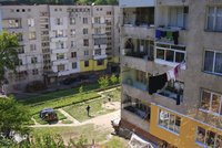 Click image for larger version

Name:	kids-on-a-small-playground-apartment-blocks-clothes-hanging-to-dry.jpg
Views:	106
Size:	769.9 KB
ID:	2620879