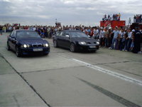 Click image for larger version

Name:	bmw_versus_audi.jpg
Views:	440
Size:	62.4 KB
ID:	9111