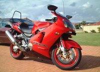 Click image for larger version

Name:	2000 Kawasaki ZX-12R red.jpg
Views:	190
Size:	54.3 KB
ID:	389861