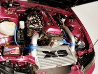 Click image for larger version

Name:	0312it_10z+Nissan_240sx+Engine_Bay_View.jpg
Views:	24
Size:	98.2 KB
ID:	1529321