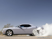 Click image for larger version

Name:	0803_04a+2009_dodge_challenger.jpg
Views:	33
Size:	68.9 KB
ID:	946139