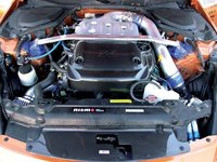 Click image for larger version

Name:	0410it_02z+Nissan_350z+Engine_Bay_View.jpg
Views:	33
Size:	72.9 KB
ID:	1449986