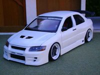 Click image for larger version

Name:	toma_lancer_evo_7_1.jpg
Views:	31
Size:	32.8 KB
ID:	1897800